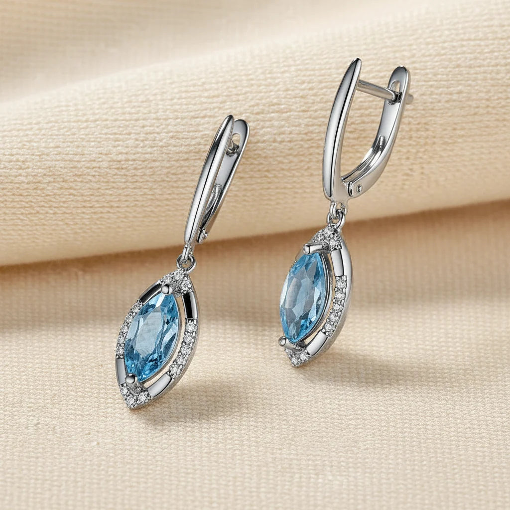 Natural Sky Blue Topaz Marquise Drop Earrings in Sterling Silver