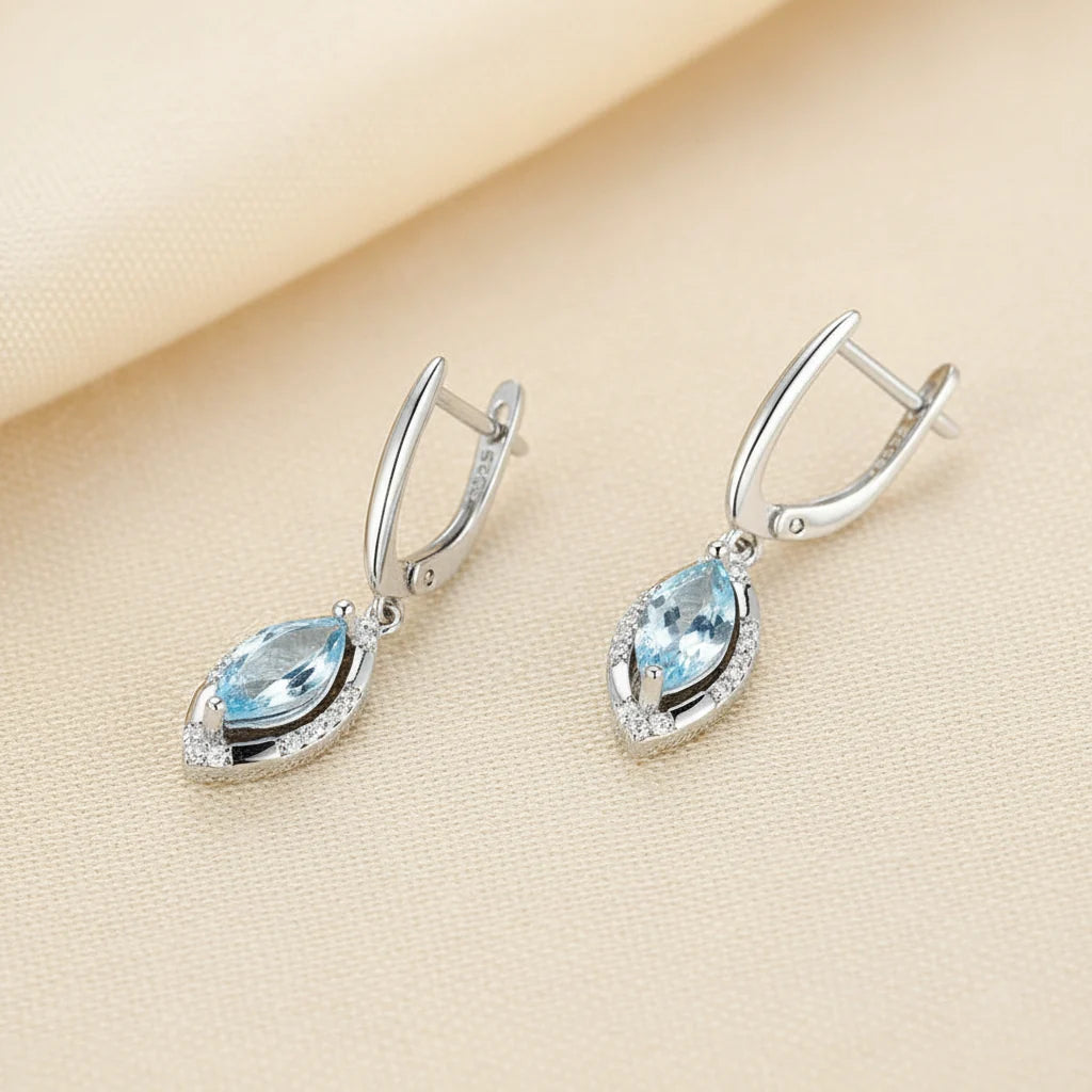 Natural Sky Blue Topaz Marquise Drop Earrings in Sterling Silver
