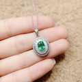 Natural Emerald Halo Pendant Necklace in Sterling Silver