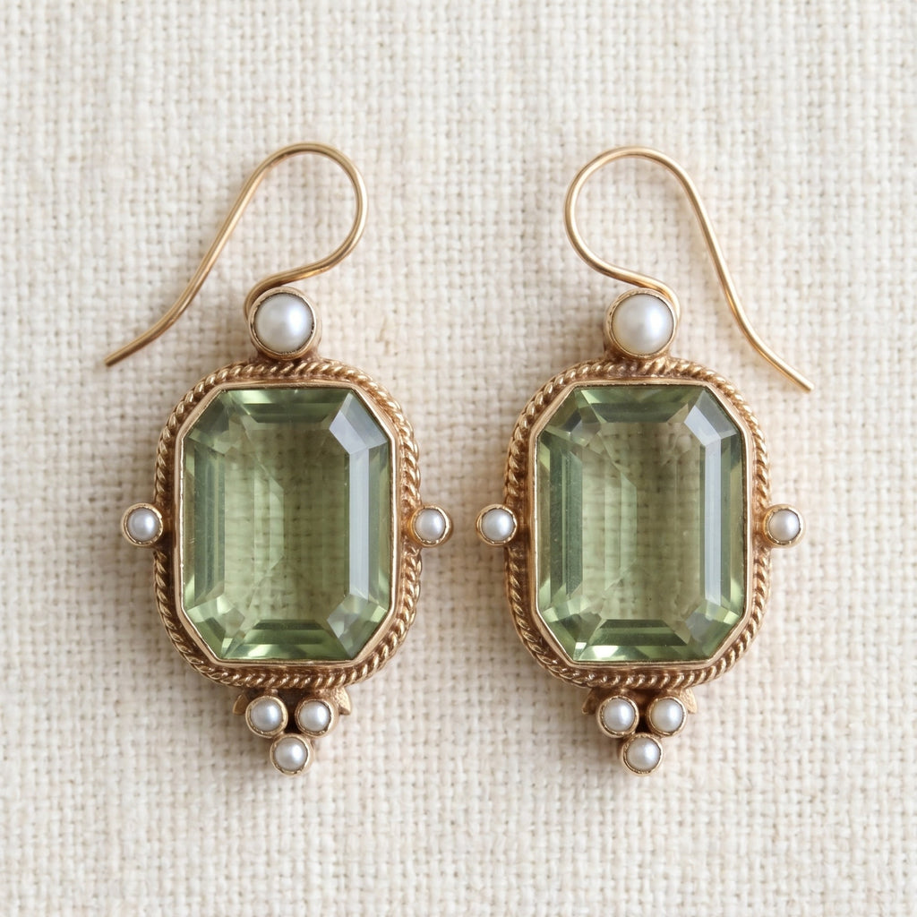 By Sophi Vintage Green and Pearl Earrings flat-lay on warm cream