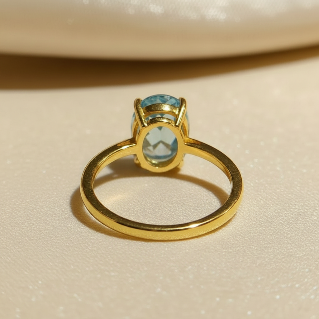 Natural Blue Topaz Solitaire Ring in Gold