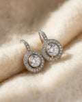 By Sophi Vintage Silver Earrings with Zirconia flat-lay on warm cream wool