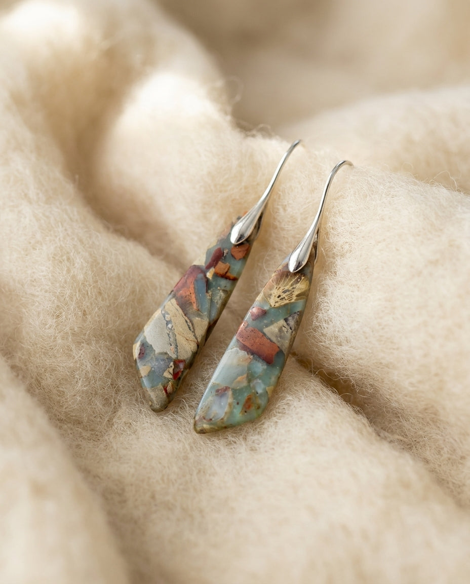By Sophi Vintage Nature Stone Earrings flat-lay on warm cream wool