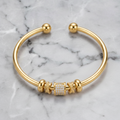 Adjustable Bracelet with Golden Charms