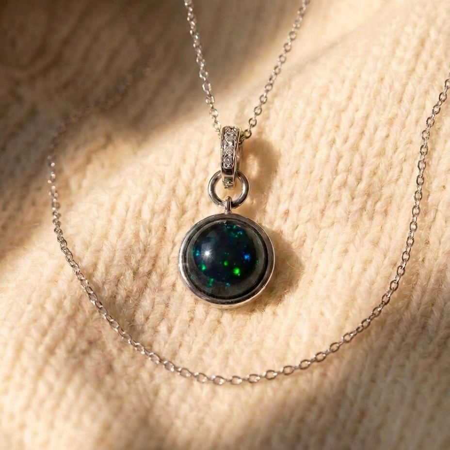 By Sophi Colorful Black Opal Necklace, Black Opal 3 green-flash variant on warm cream wool