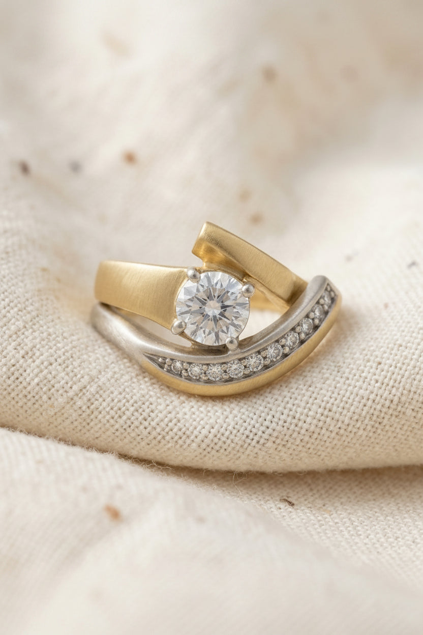 Vintage irregular gold and silver zirconia ring detail macro on neutral background