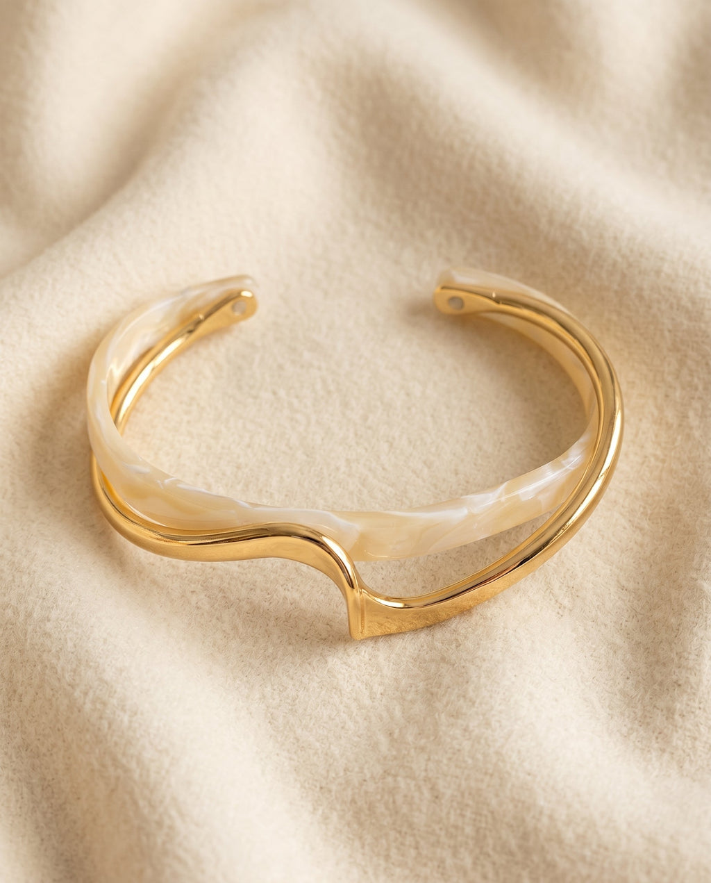 By Sophi White Opal Elegant Golden Bracelet cuff flat-lay on warm cream